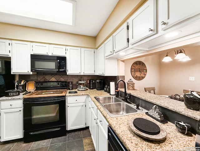 kitchen featuring black appliances, light stone countertops, decorative backsplash, sink, and white cabinets