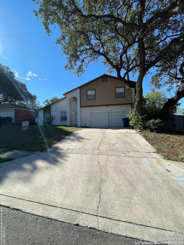 view of front of property featuring a garage