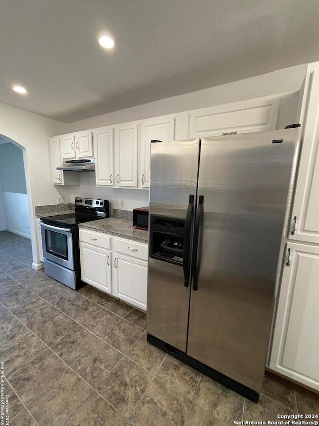 kitchen featuring white cabinets and stainless steel appliances