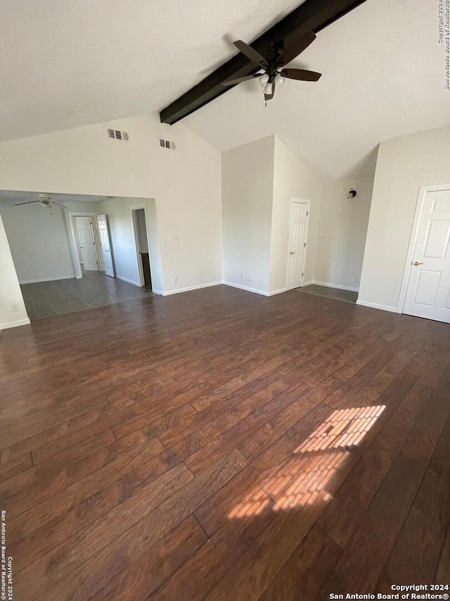 unfurnished living room featuring dark hardwood / wood-style flooring, vaulted ceiling with beams, and ceiling fan