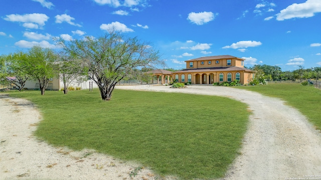 view of front of home with a front lawn