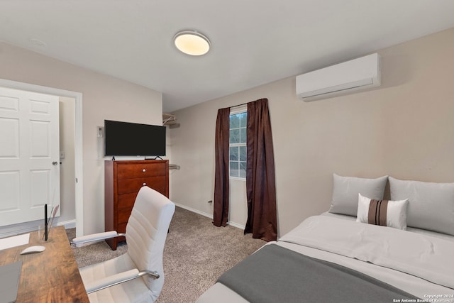 carpeted bedroom with a wall mounted air conditioner