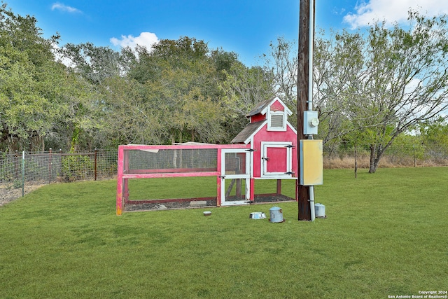 view of outdoor structure featuring a yard