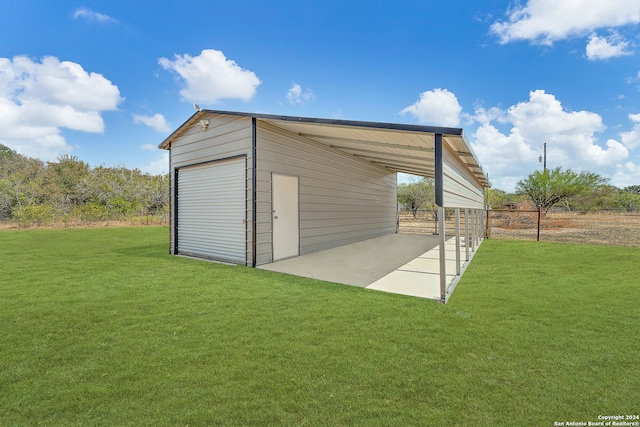 view of outbuilding with a lawn