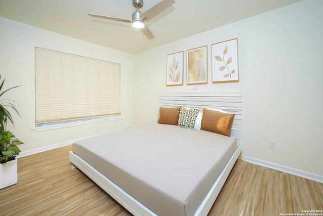 bedroom featuring ceiling fan and light wood-type flooring