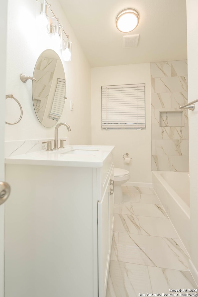 full bathroom featuring toilet, vanity, and shower / bath combination