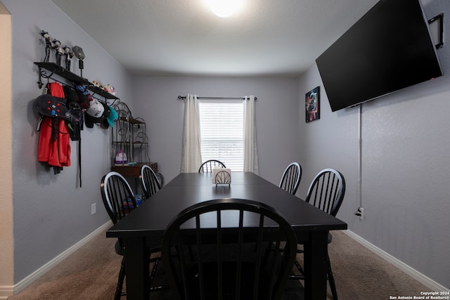 dining area with carpet flooring