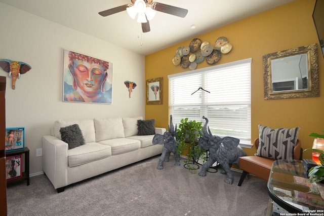 carpeted living room featuring ceiling fan