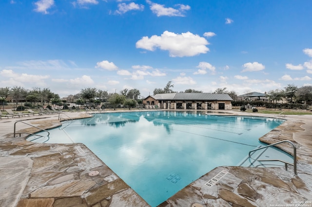 view of pool featuring a patio area