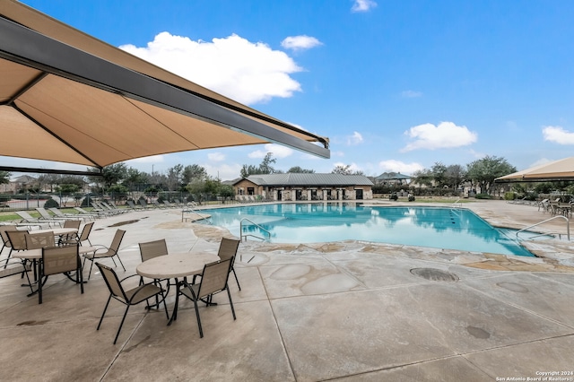 view of pool with a patio area