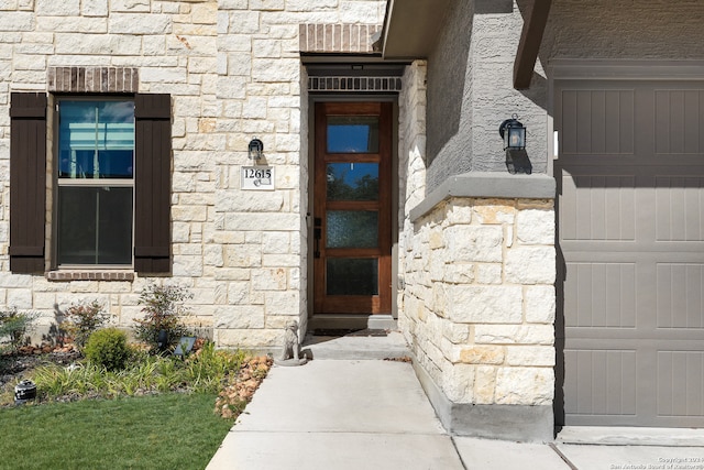 entrance to property featuring a garage