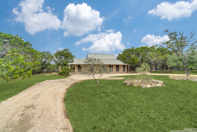 view of front of home with a front lawn