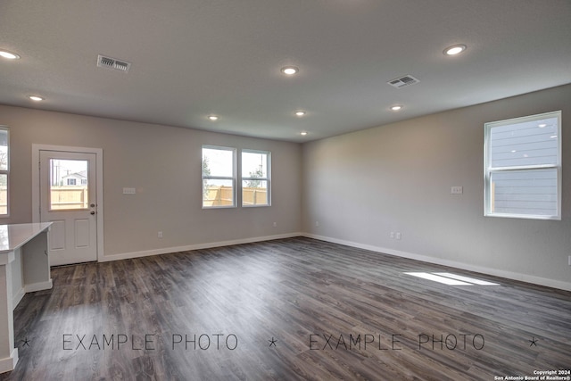 interior space with dark hardwood / wood-style floors