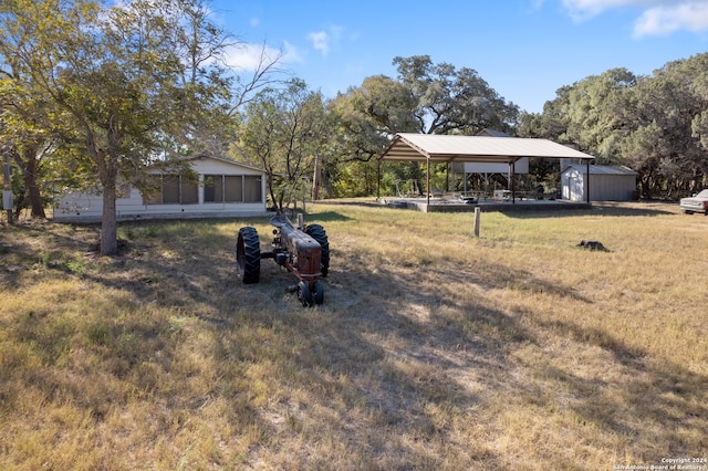 view of yard featuring a carport