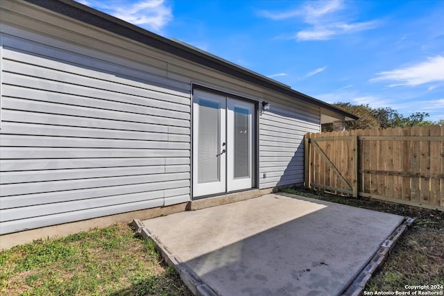 doorway to property with french doors and a patio