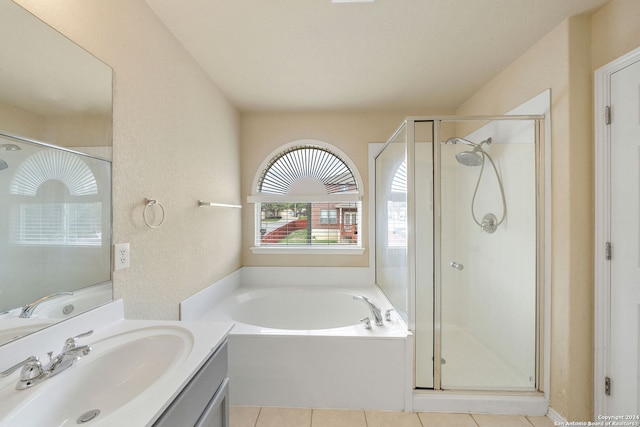 bathroom with vanity, tile patterned flooring, and separate shower and tub