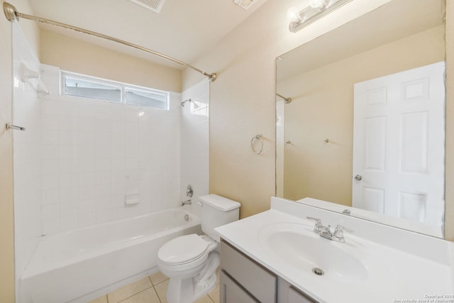 full bathroom with vanity, tile patterned flooring, toilet, and tiled shower / bath combo