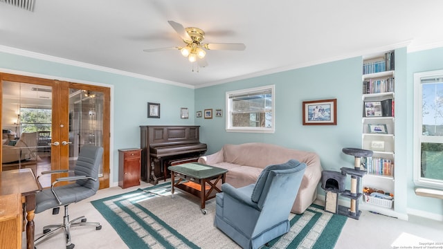 sitting room with french doors, light colored carpet, ornamental molding, ceiling fan, and built in features