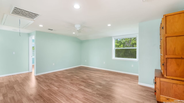 spare room with light hardwood / wood-style floors and ceiling fan