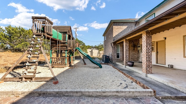 view of play area featuring central AC unit