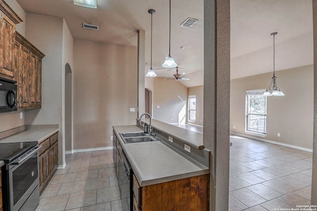 kitchen featuring sink, ceiling fan, light tile patterned flooring, pendant lighting, and stainless steel electric range oven