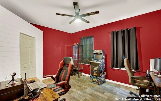 office space with hardwood / wood-style floors and ceiling fan