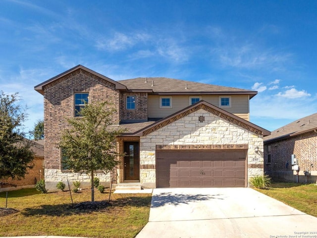 front facade with a garage and a front yard