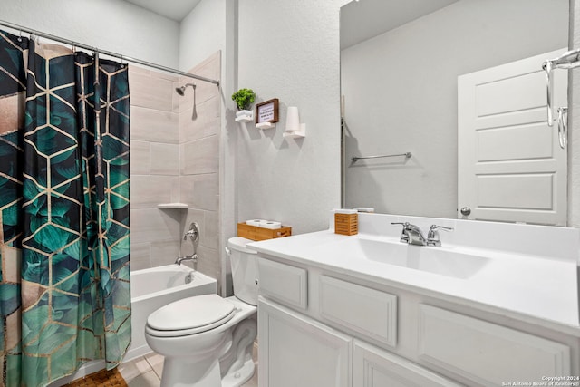 full bathroom featuring toilet, vanity, tile patterned floors, and shower / bath combo with shower curtain