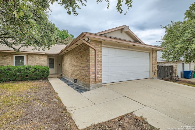 single story home with a garage