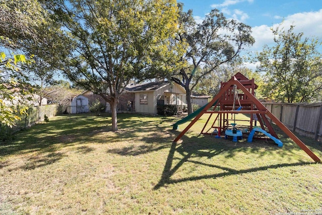 view of jungle gym with a lawn