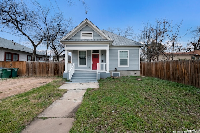 bungalow with a front yard