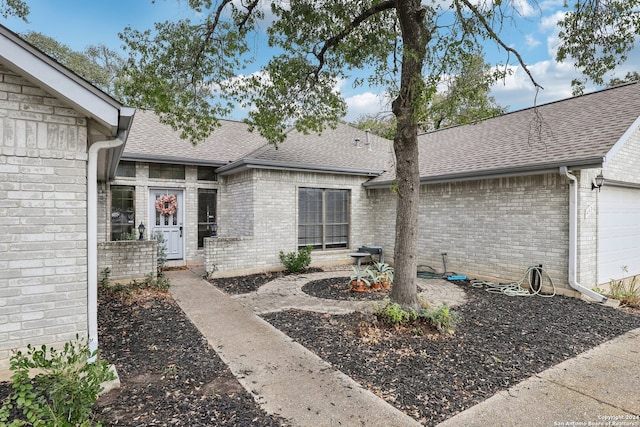 exterior space with a garage