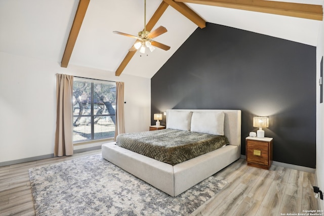 bedroom with high vaulted ceiling, light wood-type flooring, ceiling fan, and beamed ceiling