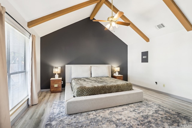 bedroom with beamed ceiling, ceiling fan, and light hardwood / wood-style flooring