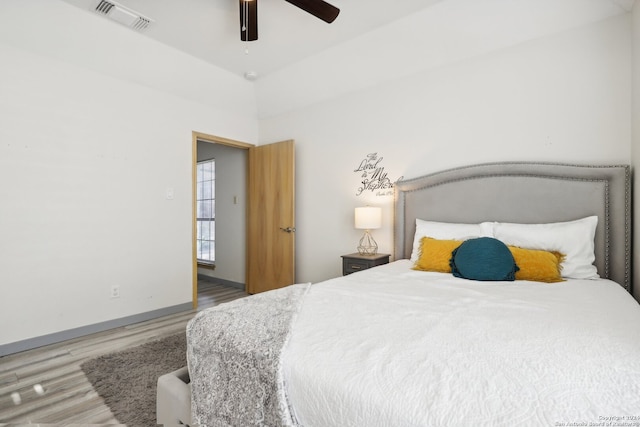 bedroom featuring wood-type flooring and ceiling fan