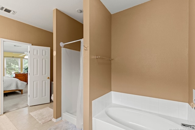 bathroom with ceiling fan and shower with separate bathtub