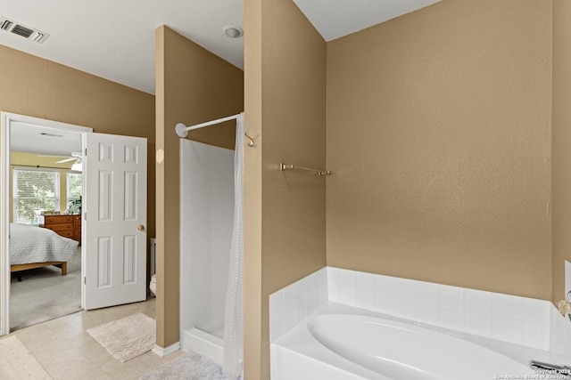 7303 Autumn Flower, Converse, TX 78109 - ensuite bathroom featuring a stall shower, a bath, and toilet