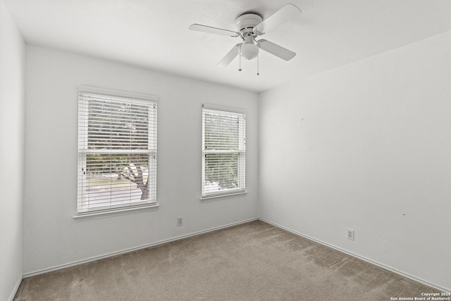 7303 Autumn Flower, Converse, TX 78109 - empty room with carpet, a ceiling fan, and baseboards