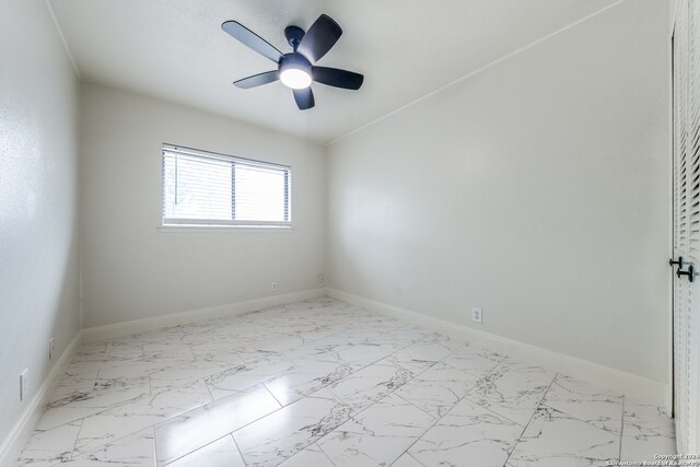 unfurnished room featuring ceiling fan