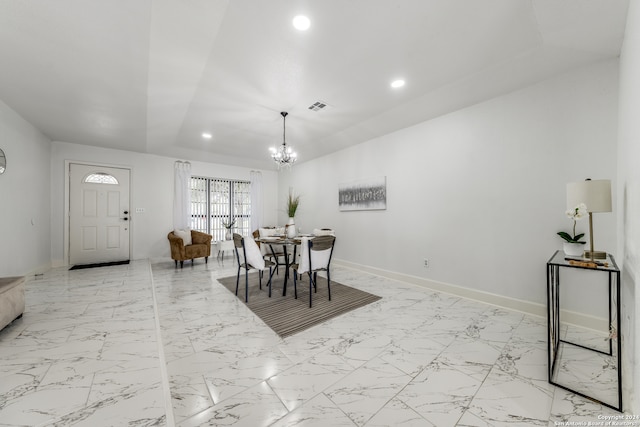 dining room featuring a chandelier