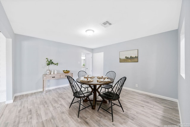 dining room featuring light hardwood / wood-style floors