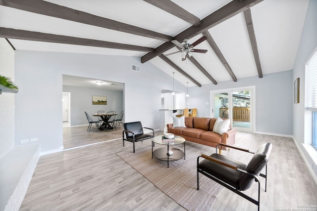 living room featuring beamed ceiling, light hardwood / wood-style floors, ceiling fan, and high vaulted ceiling