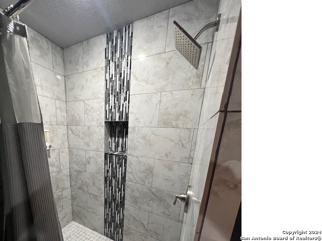 bathroom featuring walk in shower