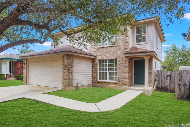 view of front facade featuring a front yard