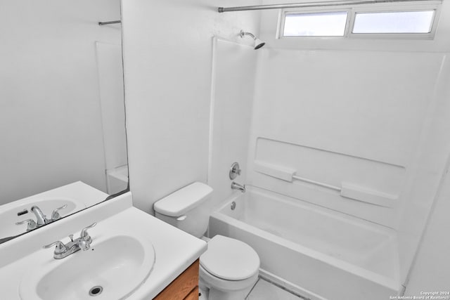 full bathroom featuring vanity, tile patterned floors, toilet, and bathtub / shower combination