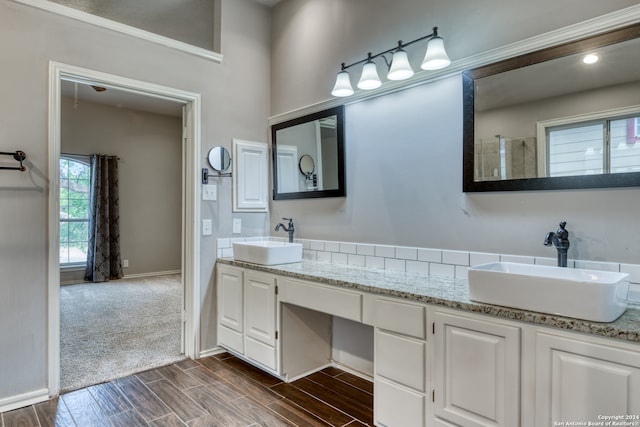 bathroom featuring hardwood / wood-style floors and vanity