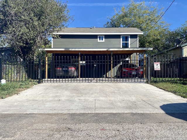 view of front of home featuring a carport