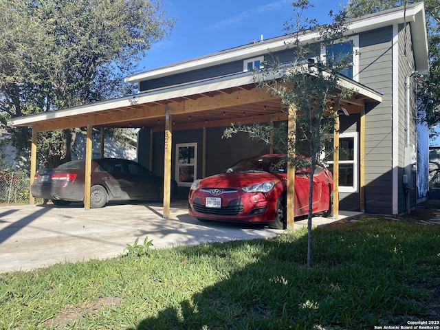 view of parking / parking lot featuring a carport