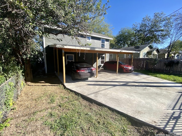 exterior space featuring a carport