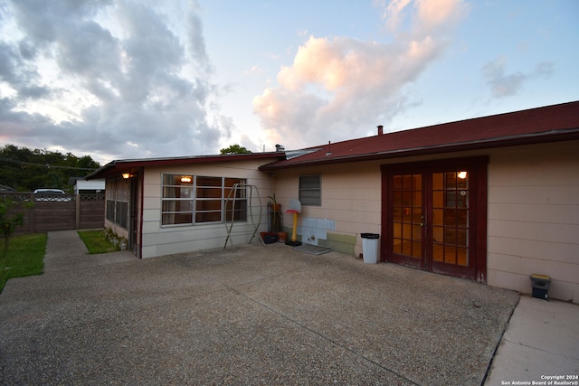 rear view of property featuring a patio area